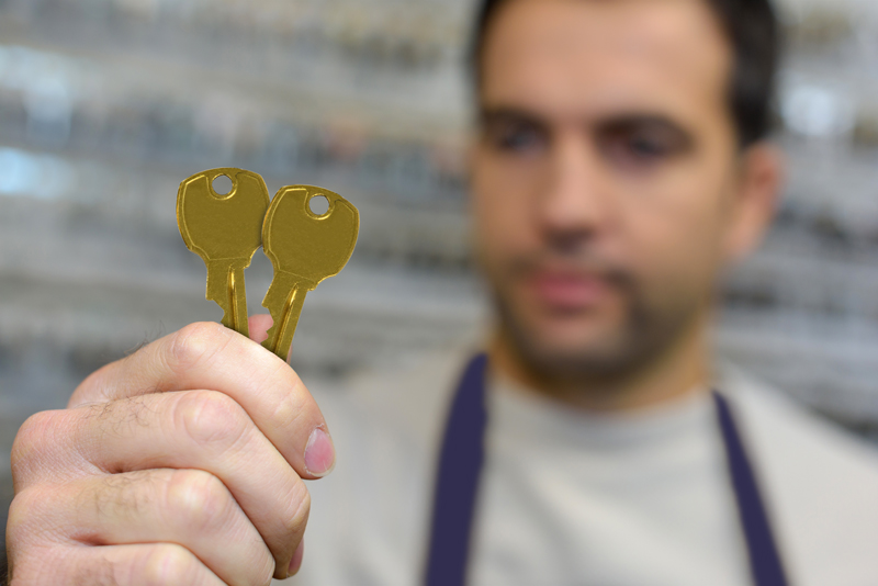 USPS Worker Holding Replacement Mailbox Keys