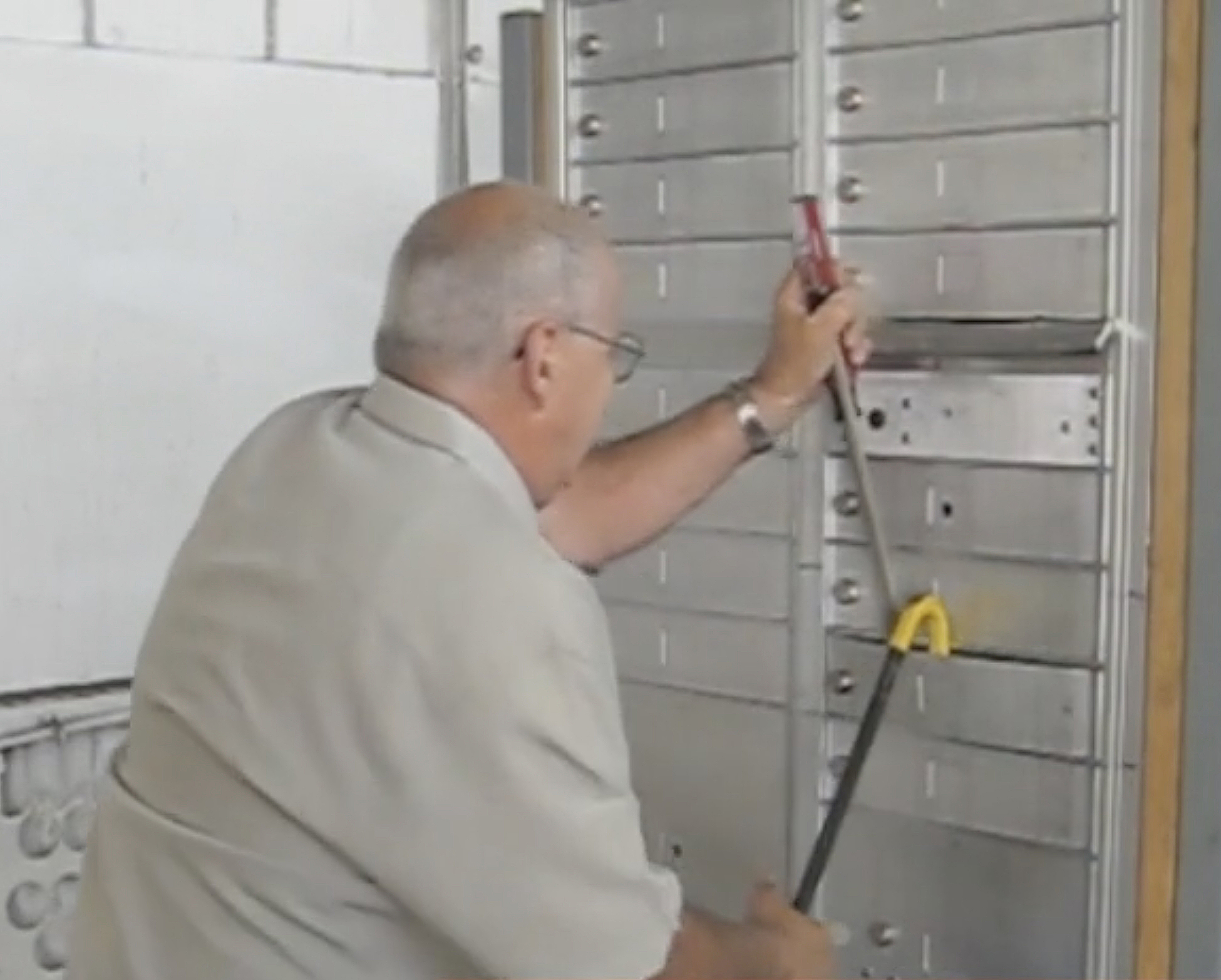 Man Trying to Break Into Mailboxes